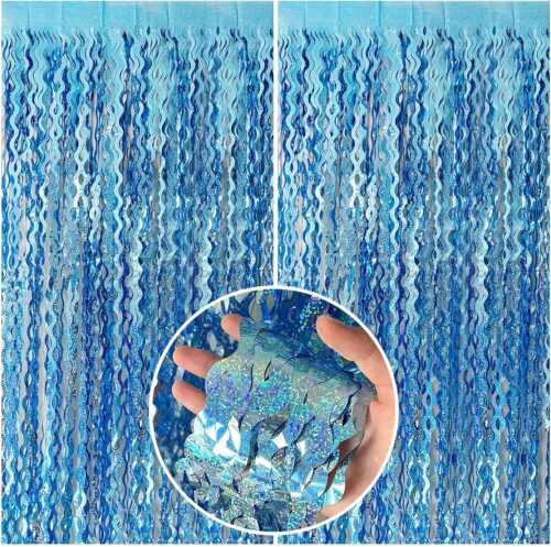 This is our stunning blue holographic fringe curtain. It's made from super sparkly iridescent glitter material cut into these beautiful wavy, leaf-like fringes that catch the light from every angle and create a magical shimmering effect. Perfect for parties, photo backdrops, mermaid themes, or any ocean-inspired event.