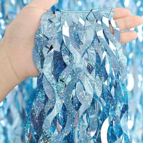This ice blue glitter party tassel curtain is made of high-gloss metallic foil with multi-color glitter, cut into wavy tassel shape, creating dreamy ocean gradient blue, lightweight and sparkling, perfect for party, wedding and photo backdrop decoration. We can customize size, color, glitter density and logo printing according to your needs, offering B2B bulk production with fast delivery and stable quality.