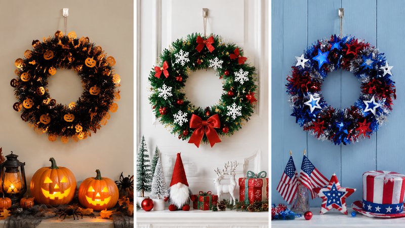 Halloween themed tinsel wreaths in black orange and red with pumpkin decorations displayed as seasonal party decor